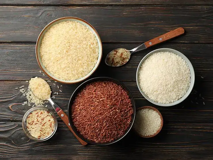Three different types of rice - white, brown and red