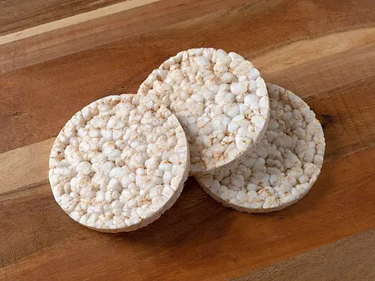 Puffed rice cakes on a wooden table