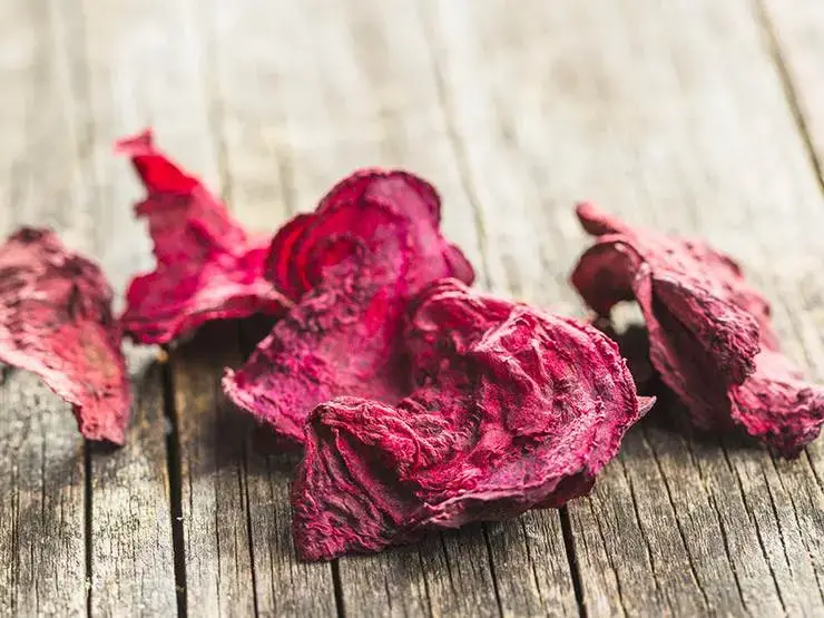 Dried beets on a wooden table