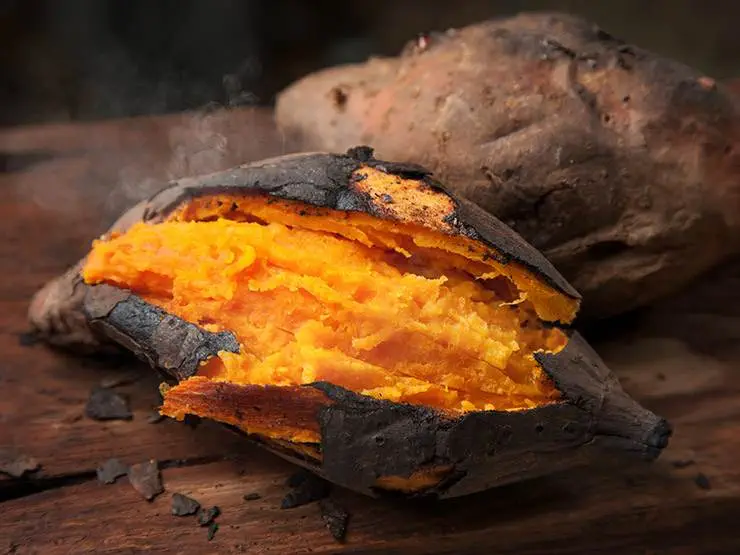 Fresh baked sweet potatoes on a table
