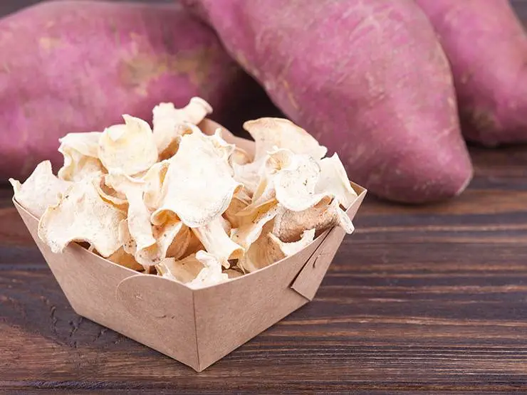 Dried and dehydrated sweet potatoes in a paper box