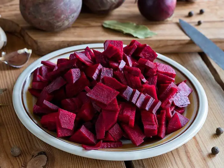 Slices of beetroots in a white plate